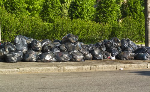 Workers sorting recyclables at a local material recovery facility serving Fitzrovia